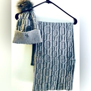 Infinity scarf and faux fur pom pom hat